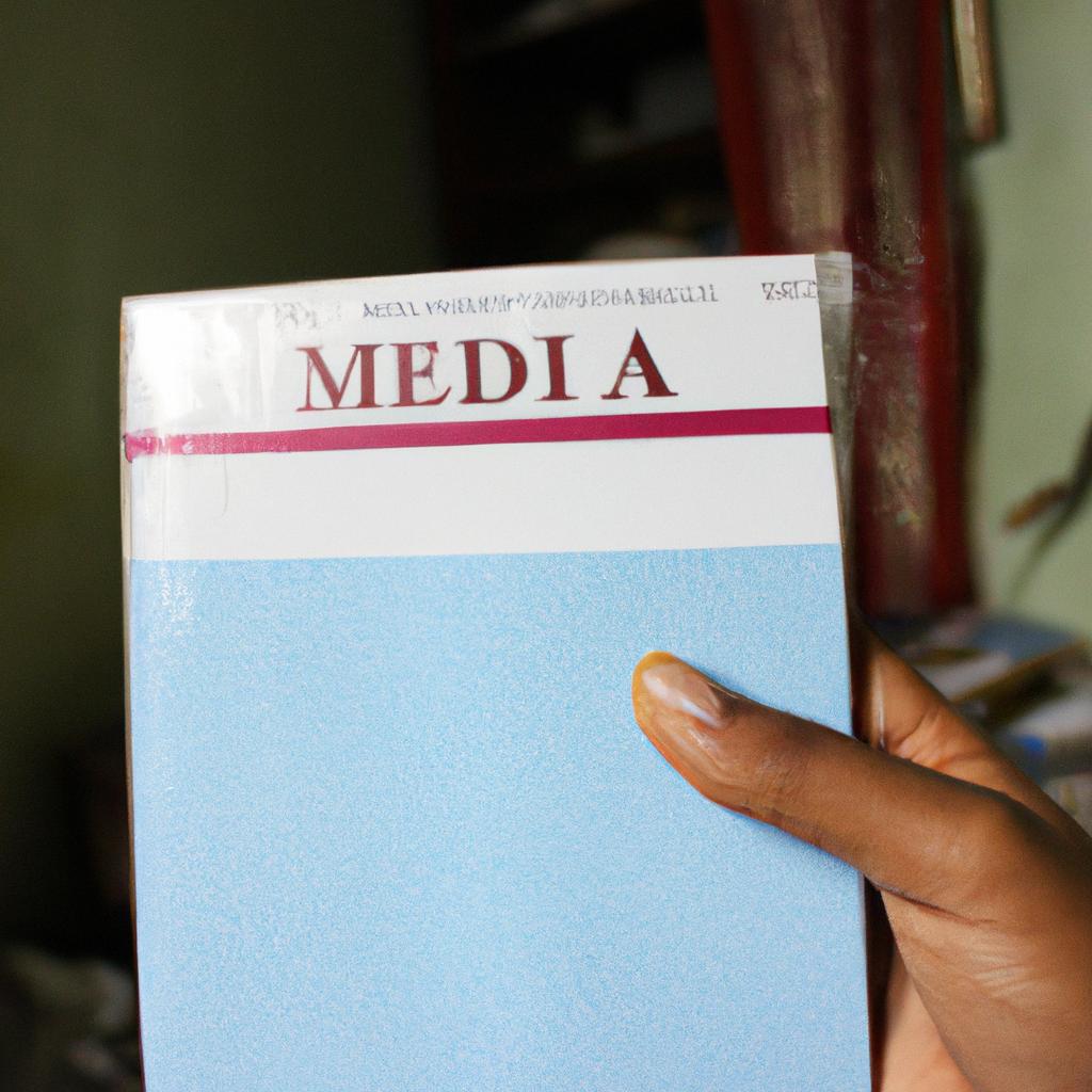 Person holding medical information pamphlet